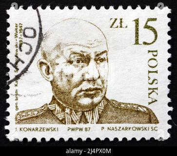 POLAND - CIRCA 1987: a stamp printed in the Poland shows General Karol Swierczewski Walter, circa 1987 Stock Photo