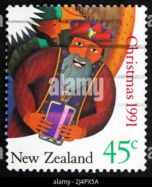 NEW ZEALAND - CIRCA 1991: a stamp printed in the New Zealand shows Wise Man, Gift, Christmas, circa 1991 Stock Photo