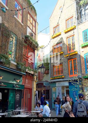 View of Neal's Yard a colourful hidden courtyard of independent restaurants, bars and shops in Covent Garden London Stock Photo