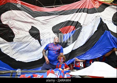 As a big Crystal Palace banner is unfurled a man and his son apper underneath during the FA Cup Semi Final match between Chelsea and Crystal Palace at Wembley Stadium on April 17th 2022 in London, England. (Photo by Garry Bowden/phcimages.com) Stock Photo