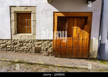 Traditional facade of old architecture in the village of Salamanca, Candelario. Stock Photo