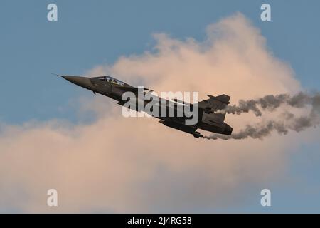 Gdynia; Poland - August 21; 2021: Flight of the Swedish JAS 39 Gripen fighter plane at the Aero Baltic show in Gdynia; Poland. Stock Photo