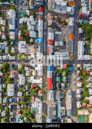 Beautiful cinematic aerial footage of the Icelands capital Reykjavik, the Cathedral and Beautiful city Stock Photo