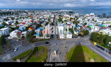 Beautiful cinematic aerial footage of the Icelands capital Reykjavik, the Cathedral and Beautiful city Stock Photo