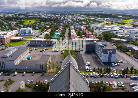 Beautiful cinematic aerial footage of the Icelands capital Reykjavik, the Cathedral and Beautiful city Stock Photo