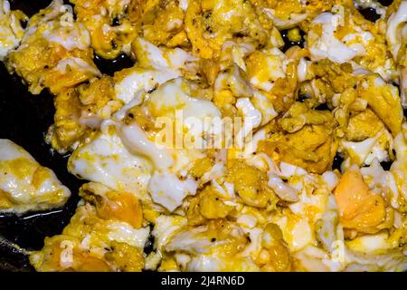 Scrambled eggs. Cooking ingredients from a farmers markets for breakfast Stock Photo
