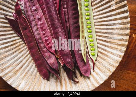 Pile of Guaje seed pods on a plate in Oaxaca, Mexico Stock Photo