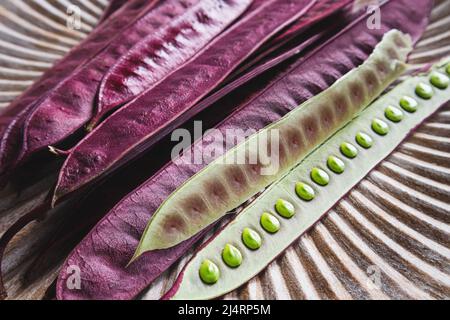 Pile of Guaje seed pods on a plate in Oaxaca, Mexico Stock Photo