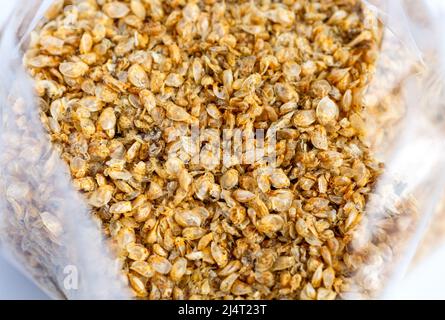 Dry Daphnia fish feed bag, package on White background. Stock Photo