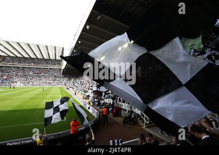 NEWCASTLE UPON TYNE, UK. Newcastle United's fans wave flags provided by supporters group 'Wor Flags' before the kick off the Premier League match between Newcastle United and Leicester City at St. James's Park, Newcastle on Sunday 17th April 2022. (Credit: Mark Fletcher | MI News) Credit: MI News & Sport /Alamy Live News Stock Photo