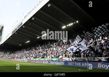 NEWCASTLE UPON TYNE, UK. Newcastle United's fans wave flags provided by supporters group 'Wor Flags' before the kick off the Premier League match between Newcastle United and Leicester City at St. James's Park, Newcastle on Sunday 17th April 2022. (Credit: Mark Fletcher | MI News) Credit: MI News & Sport /Alamy Live News Stock Photo