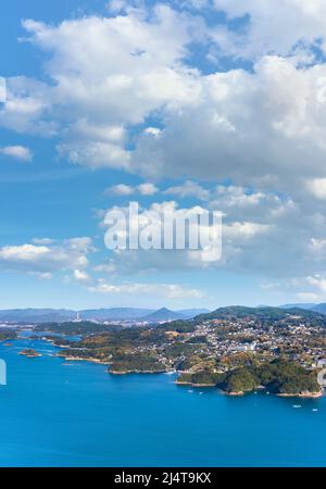 kyushu, japan - december 09 2021: Bird's-eye view from the Tenkaiho Observatory of the saw-toothed coast of Sasebo and Kujūkushima meaning 99 Islands Stock Photo