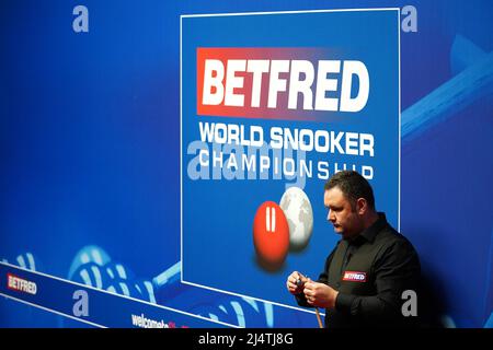 Scotland's Stephen Maguire in action against England's Shaun Murphy during day two of the Betfred World Snooker Championships at The Crucible, Sheffield. Picture date: Sunday April 17, 2022. Stock Photo