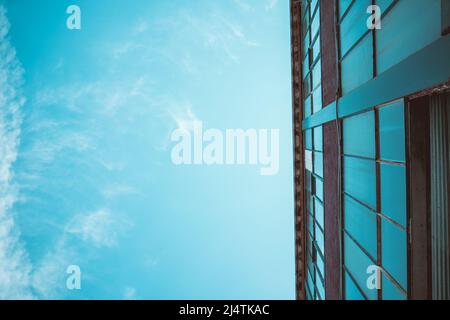 Old factory facade seen from below Stock Photo