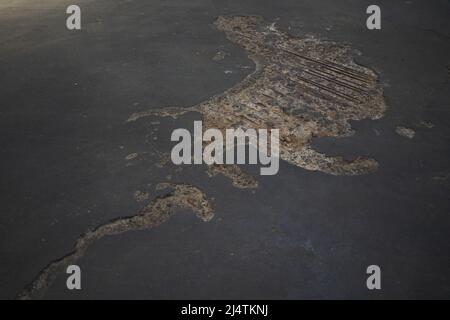Texture of a hole in a modern concrete warehouse floor Stock Photo