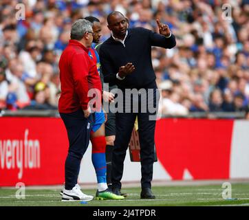 LONDON, ENGLAND - APRIL 17:Crystal Palace manager Patrick Vieira  give final instructions to Crystal Palace's Jordan Ayew before going on  during FA C Stock Photo