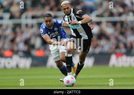 NEWCASTLE UPON TYNE, UK. Newcastle United's Joelinton in action with Leicester City's Youri Tielemans during the Premier League match between Newcastle United and Leicester City at St. James's Park, Newcastle on Sunday 17th April 2022. (Credit: Mark Fletcher | MI News) Credit: MI News & Sport /Alamy Live News Stock Photo