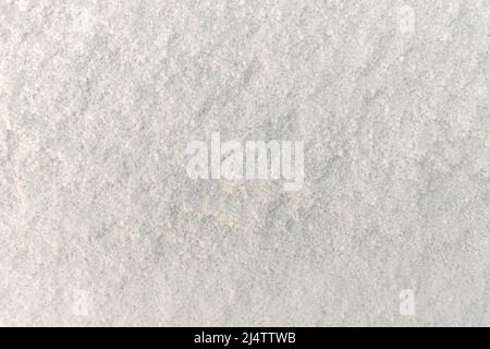 Full Frame Flatlay of A Thin Fresh Layer of Graupel Snow Stock Photo