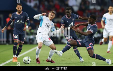 Paris, France. 17th Apr, 2022. Paris Saint Germain's Idrissa Gana Guey (3th L) vies with Marseille's Valentin Rongier (2nd L) during a French Ligue 1 football match between Paris Saint Germain (PSG) and Marseille in Paris, France, April 17, 2022. Credit: Gao Jing/Xinhua/Alamy Live News Stock Photo