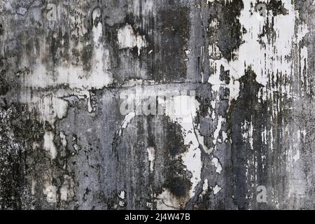 Old black and white distressed concrete wall in Indonesia. Background texture. Stock Photo