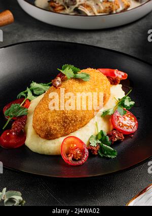 Chicken kiev cutlet with mashed potato Stock Photo