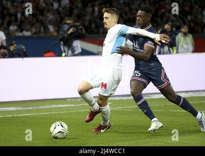 Valentin Rongier of Marseille, Nuno Mendes of PSG during the French championship Ligue 1 football match between Paris Saint-Germain (PSG) and Olympique de Marseille (OM) on April 17, 2022 at Parc des Princes stadium in Paris, France - Photo: Jean Catuffe/DPPI/LiveMedia Stock Photo