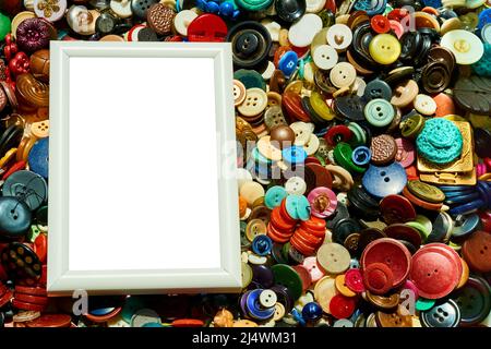 Blank frame and place for text on tailor buttons background Stock Photo