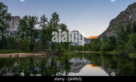 Last Light on Clouds Rest from Sentinel Beach, in Yosemite National Park, near Merced, California. Stock Photo