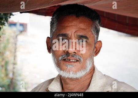 Portrait of a  fruit vendor  in Trichy, Tamil Nadu, India Stock Photo