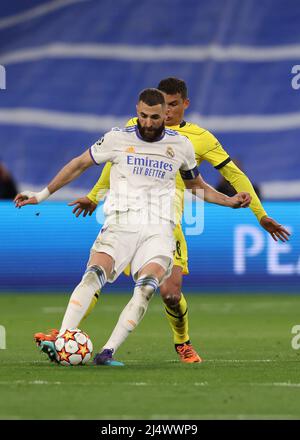 Madrid, Spain, 12th April 2022. Karim Benzema of Real Madrid is challenged by Thiago Silva of Chelsea FC during the UEFA Champions League match at the Bernabeu, Madrid. Picture credit should read: Jonathan Moscrop / Sportimage Stock Photo