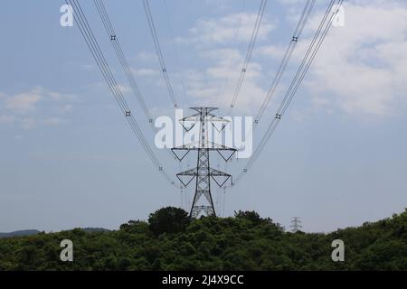 the transmission tower against the blue sky in Hong Kong Stock Photo