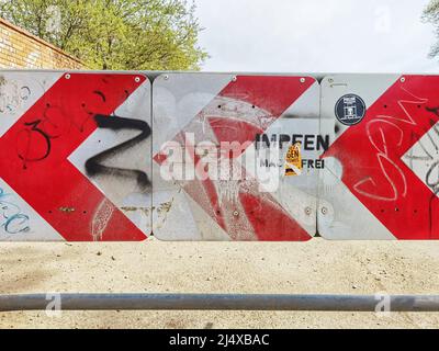 Munich, Bavaria, Germany. 18th Apr, 2022. A series of recently spray painted Z-Symbols as seen near the wall of the Nymphenberg Castle in Munich, Germany. At least one was painted near ''Impfen Macht Frei'' Graffiti left by anti-vaxxer conspiracy theorists who are often Putinists. Bavaria has made the display of the symbol a potential crime based on the endorsement of crimes perpetrated by a state including human rights violations with other states either following suit or verifying. The symbol, believed to mean za pobedu (for victory) is one of an assortment of symbols, such as the V or O, Stock Photo