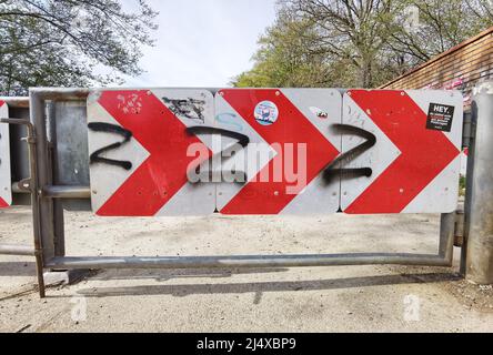 Munich, Bavaria, Germany. 18th Apr, 2022. A series of recently spray painted Z-Symbols as seen near the wall of the Nymphenberg Castle in Munich, Germany. At least one was painted near ''Impfen Macht Frei'' Graffiti left by anti-vaxxer conspiracy theorists who are often Putinists. Bavaria has made the display of the symbol a potential crime based on the endorsement of crimes perpetrated by a state including human rights violations with other states either following suit or verifying. The symbol, believed to mean za pobedu (for victory) is one of an assortment of symbols, such as the V or O, Stock Photo