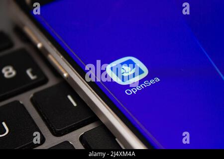 OpenSea mobile application icon on smartphone screen. Afyonkarahisar, Turkey - April 18, 2022. Stock Photo