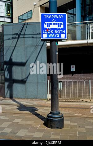 Tram warning sign look both ways,Store Street, Manchester Piccadillly, England Stock Photo