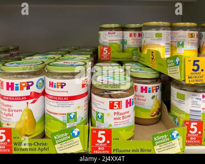 Nuremberg, Germany - April 04 2022: Baby food in a jar in the supermarket. Stock Photo