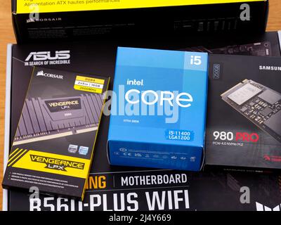 Tambov, Russian Federation - April 07, 2022 Some boxes with brand new components in them for building a new PC. Asus TUF Gaming motherboard, Intel Cor Stock Photo