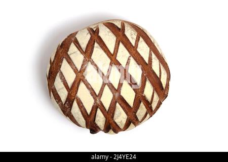 Loaf black rye bread sprinkled with flour, on a white background Stock Photo