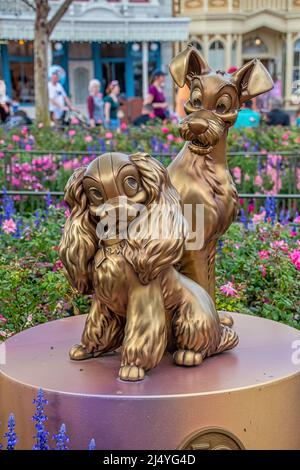 Lady and the Tramp Gold Statue 50th Anniversary Disney Magic Kingdom Stock Photo