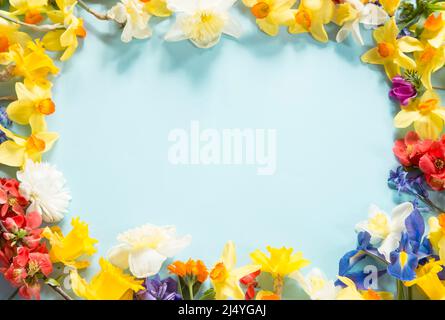 Spring floral copmosition on blue background Stock Photo