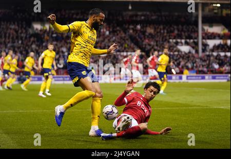 West Bromwich Albion's Kyle Bartley (left) is dispossessed by Nottingham Forest's Brennan Johnson during the Sky Bet Championship match at the City Ground, Nottingham. Picture date: Monday April 18, 2022. Stock Photo