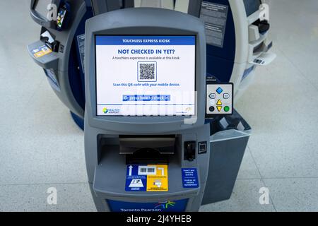 Toronto, Canada, 27 March, 2021: Passenger passport check-in kiosk for fast boarding passes and baggage to avoid lines in Toronto international Pearson airport Stock Photo