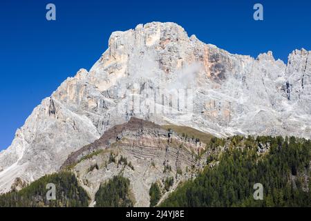 Close up of a peak in the Pala Group with an overhanging cloud Stock Photo