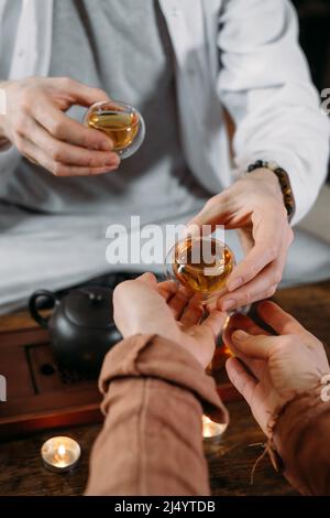 Drinking tea in traditional Chinese ceremony Gun Fu Cha Stock Photo