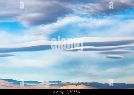 Some large lenticular clouds over southern California near Joshua Tree National Park. Stock Photo