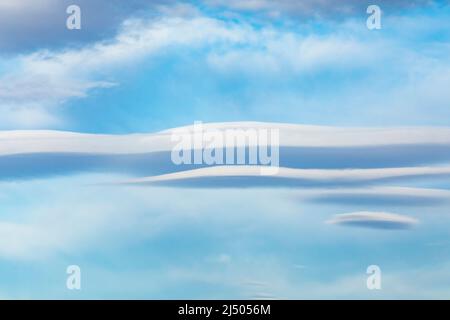 Some large lenticular clouds over southern California near Joshua Tree National Park. Stock Photo