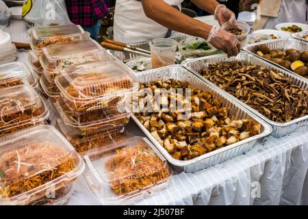 Trays of food being sold at the Thai New Year Festival at Wat Budharangsi in the Redland area of Miami-Dade County, Florida. Stock Photo