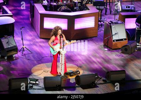 Hannah Dasher performs on the stage of The Grand Ole Opry, home to country music in Nashville, Tennessee. Stock Photo