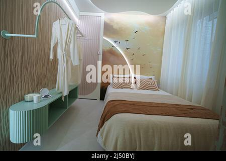 Madrid, Spain. 18th Apr, 2022. View of a bedroom designed by the Living Studio shown during the Casa Decor 2022 fair in Madrid. Casa Decor is a platform for interior design, design and trends, which takes place every year in a different location in the center of Madrid, opens an iconic and unique building to the public, which accommodates fifty spaces decorated by interior design professionals. (Photo by Atilano Garcia/SOPA Images/Sipa USA) Credit: Sipa USA/Alamy Live News Stock Photo