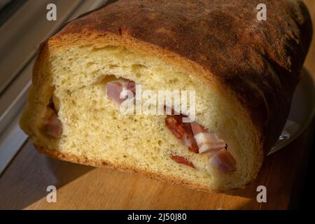 Traditional Portuguese Easter bread with chorizo ​​and bacon typical of Trás os Montes, Montalegre know as Folar da Páscoa. Portuguese tapas. Stock Photo